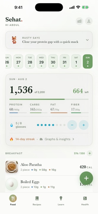 The Sehat home screen showing the day's calories, macro rings and a coach card